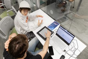 Students collaborate in Blackstone Launchpad in Bird Library as part of the Intelligence ++ workshop.